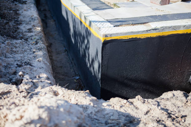 Professional Interior Drainage System technician working in Lexington, WA